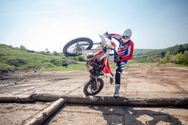 istock Hard enduro motorcycle rider training on an obstacle course 981853952