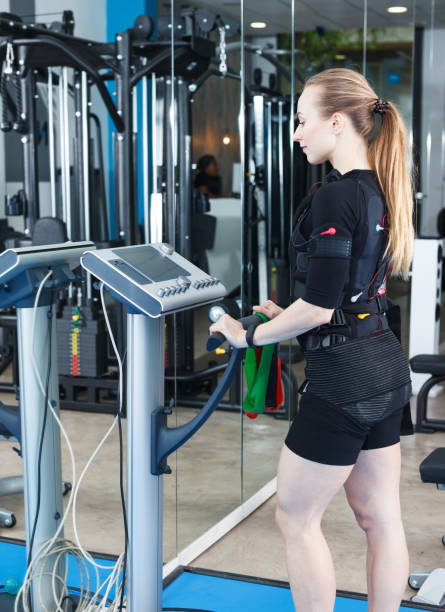 istock Woman training in EMS suit 981863652