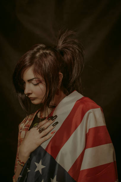 istock Girl with USA flag 981864050