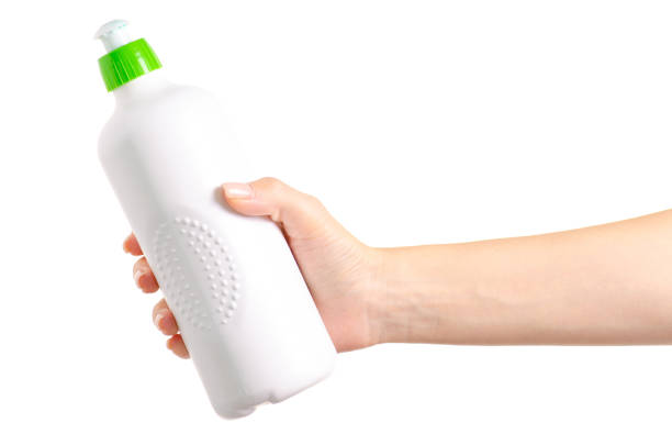 istock Detergent for utensils dishes plates in hand 981865922