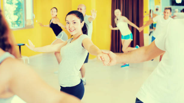 istock Young men and women dancing swing 981871604