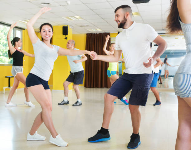 istock Young men and women dancing swing 981872142