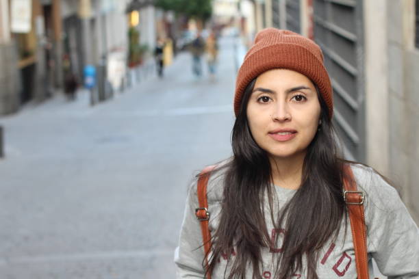 istock Trendy urban latin woman with copy space 981889438