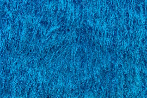 istock Ultra blue Dry straw grass background, hay texture after harvest 981893912