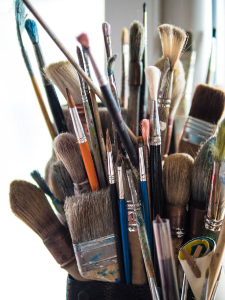 istock variety of used painter brushes 981897456