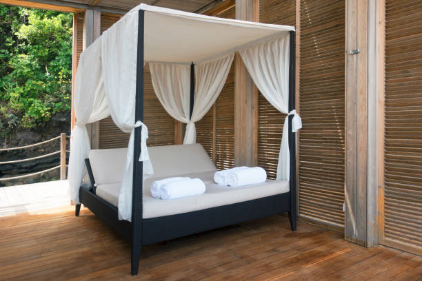 istock Romantic gazebo lounge at a tropical seaside 981898356