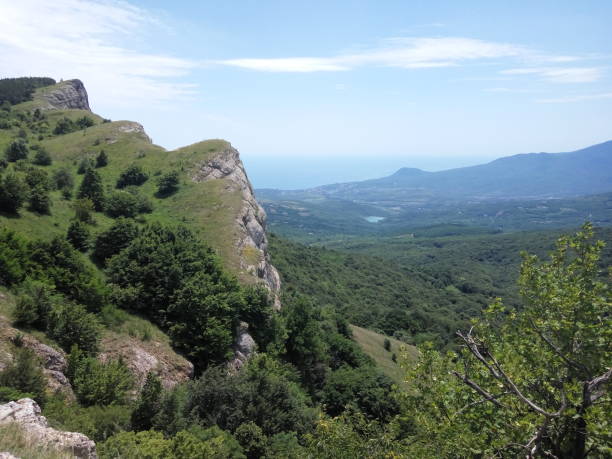 istock mountains overlooking the sea and the village 981907142