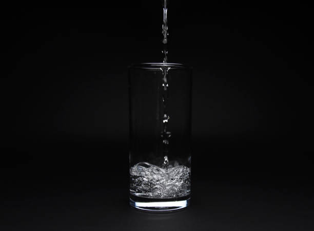 istock Empty glass of water get filled 981925742