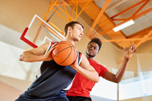 istock Two sportsmen playing basketball 981937832