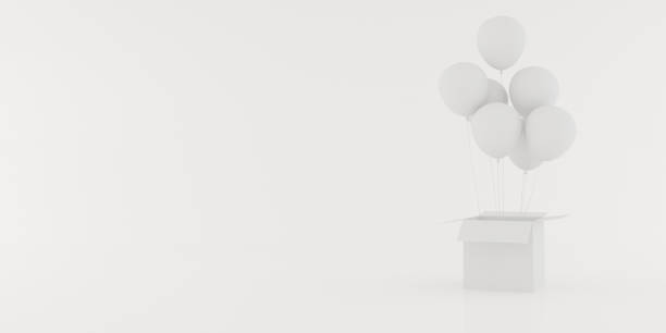 istock Abstract of white balloon floating out from the open white box on white background, 3D rendering 981943256
