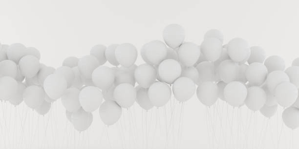 Cut out of bunch of red white and blue colored shiny colourful party balloons for joyful happy cheerful celebrations backdrops, wallpaper isolated over horizontal white background like that of US election campaign with copy space