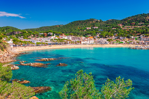 Sea landscape Llafranc near Calella de Palafrugell, Catalonia, Barcelona, Spain. Scenic old town with nice sand beach and clear blue water in bay. Famous tourist destination in Costa Brava