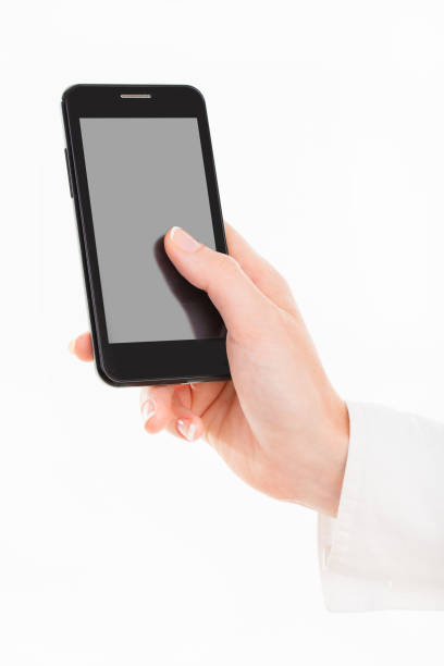 istock Business woman with young hands and beautiful nails using mobile smart phone with touch screen 981978094