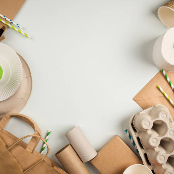 istock products made from recycled paper: disposable tableware, package, box, cardboard, egg packaging, envelope, toilet paper. concept: environmental protection, nature conservation, recycle. top view, copy space 981982840