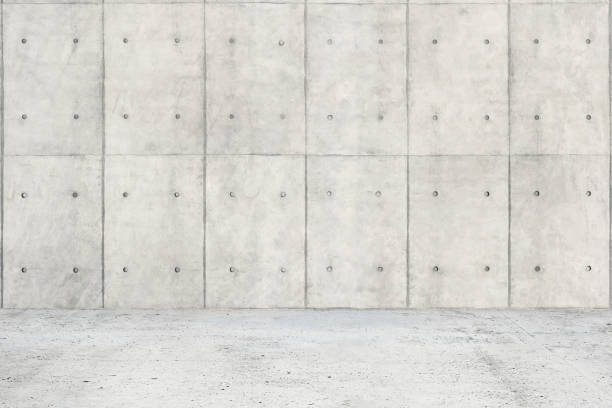 istock Abstract interior of empty room with concrete wall and floor 981990908