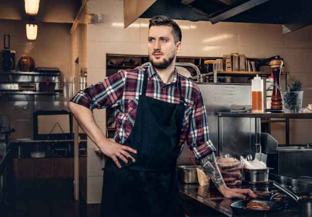 istock Portrait of master chef in a kitchen. 981991114