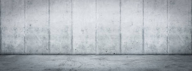istock Abstract interior of empty room with concrete wall and floor 981991602
