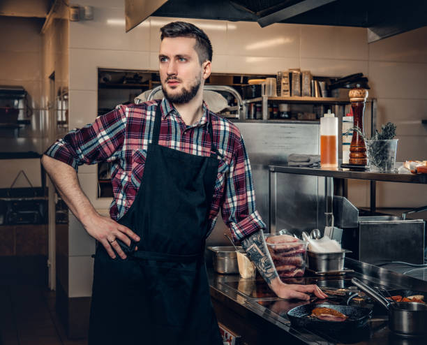 istock Portrait of master chef in a kitchen. 981992328