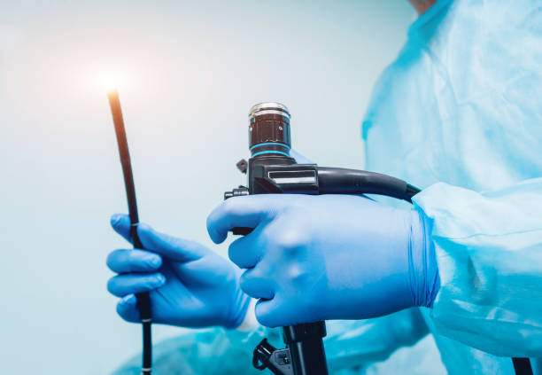 Endoscopy at the hospital. Doctor holding endoscope before gastroscopy Endoscopy at the hospital. Doctor holding endoscope before gastroscopy. Medical examination colonoscopy stock pictures, royalty-free photos & images