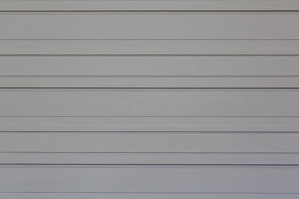 istock Wood gray background. gray synthetic wood wall texture use for background. 981997418