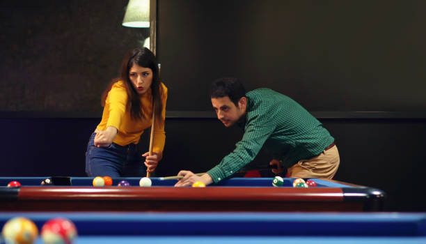 istock Friends Billiards at club 981997698