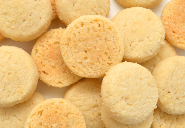 Freshly baked sugar cookies on background