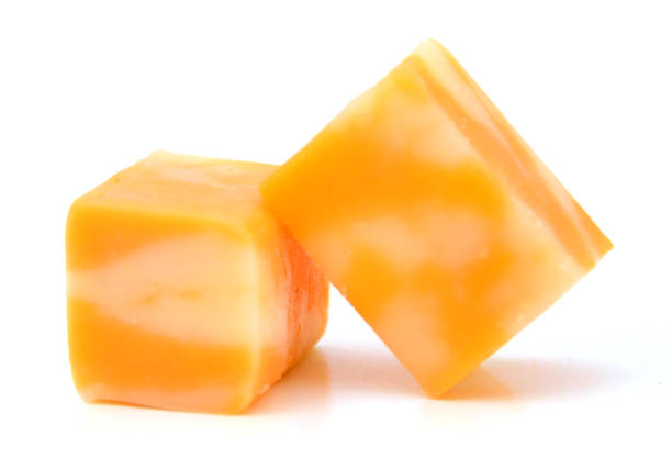 istock Cubes of Colby Cheese isolated on white 982006714