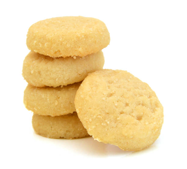 istock Freshly baked sugar cookies on white background 982006880