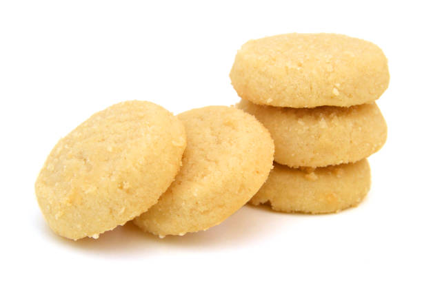 istock Freshly baked sugar cookies on white background 982007472