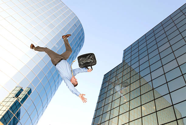 człowiek skakać od budynku - suicide businessman the end depression zdjęcia i obrazy z banku zdjęć