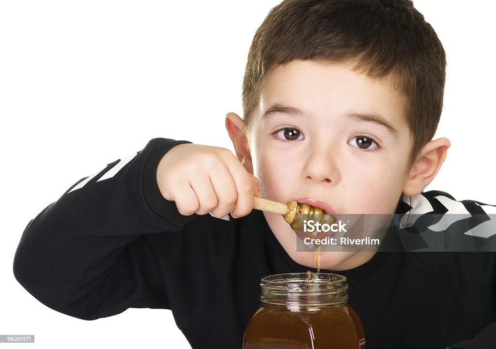 Boy and Honey  Honey Stock Photo