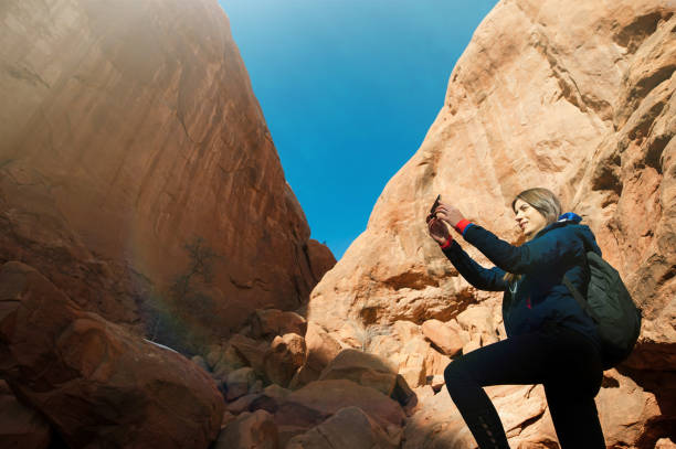 istock Female traveler taking photos 982012274