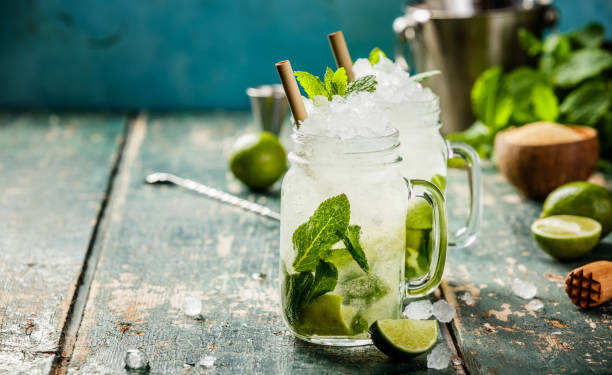 istock Mojito cocktail on wooden table 982025780