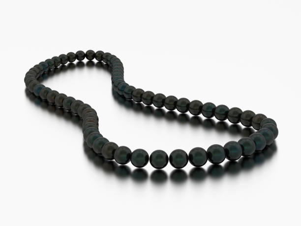 istock 3D illustration black pearl necklace beads 982046746