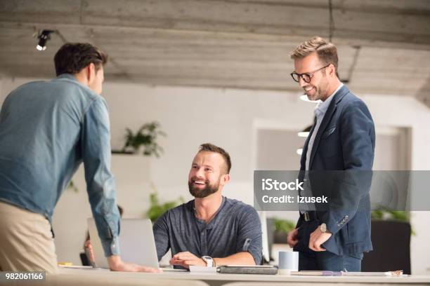 Team Of Executives Working In Office Stock Photo - Download Image Now - Adult, Adults Only, Beard