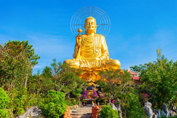 istock Golden Buddha statue in Dalat 982069216