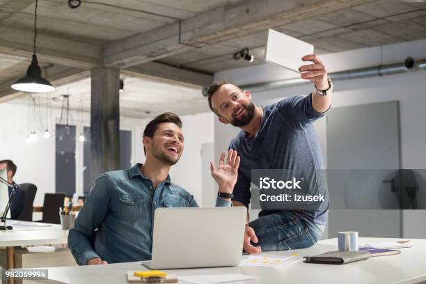 Creative Business Men Taking A Selfie With Digital Tablet Stock Photo - Download Image Now