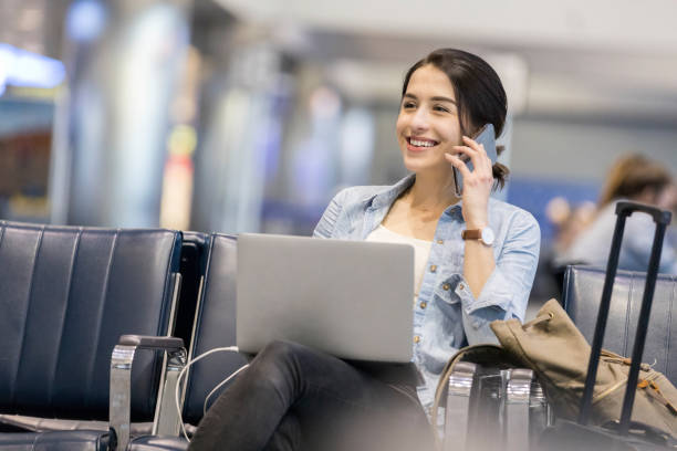 istock Young businesswoman waiting for flight 982090652