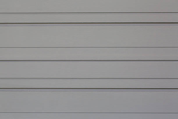 istock Wood gray background. gray synthetic wood wall texture use for background. 982101496