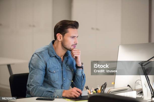 Graphic Designer Working On New Project Stock Photo - Download Image Now - Computer, Desk, Adult