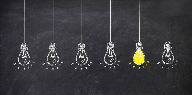 istock genius idea concept with hand drawing lamp 982113456