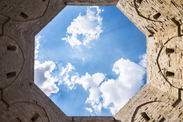 Inner courtyard of Castel del Monte with its characteristic octagonal shape, Apulia, Italy Inner courtyard of Castel del Monte with its characteristic octagonal shape, Apulia, Italy murge photos stock pictures, royalty-free photos & images