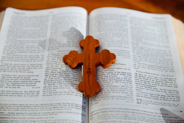 istock Crucifix and the Holy book 982133756
