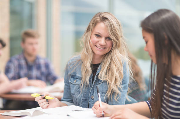 istock Portrait of college students studying in the library 982138600