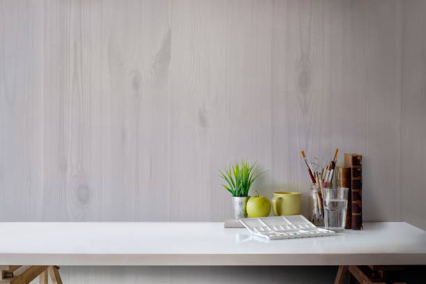 istock Desk with artist craft tools. Workspace and copy space. 982147962