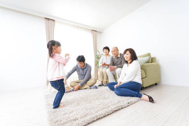 istock Happy family with dog 982163480