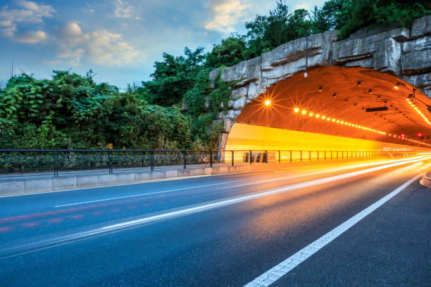 istock Urban highway tunnel at night 982163848