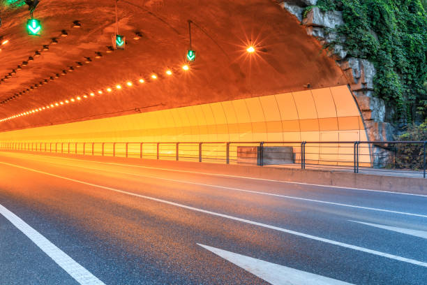 istock Urban highway tunnel at dusk 982178576