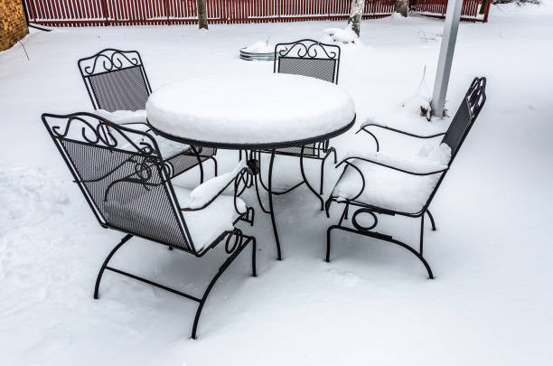 istock Snow-covered Patio Furniture 982208852