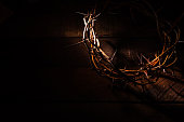 A crown of thorns on a wooden background. Easter Theme